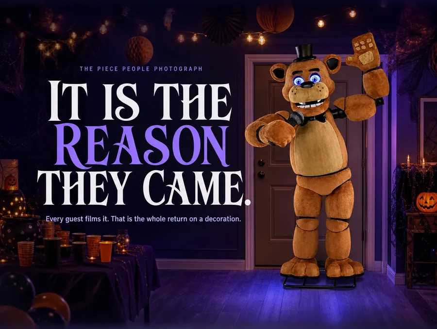 A decorated party room with the bear performing against the far wall under warm string lights.